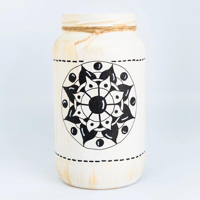 Storage jar with a black pattern