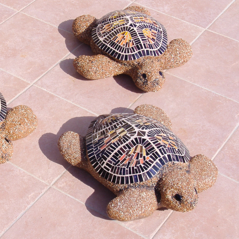 Mosaic turtles on the floor